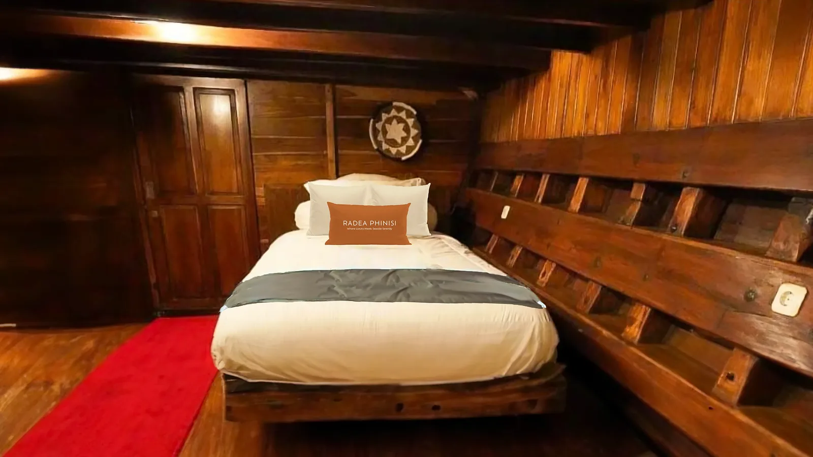 Phinisi liveaboard at anchor in Komodo National Park at first light